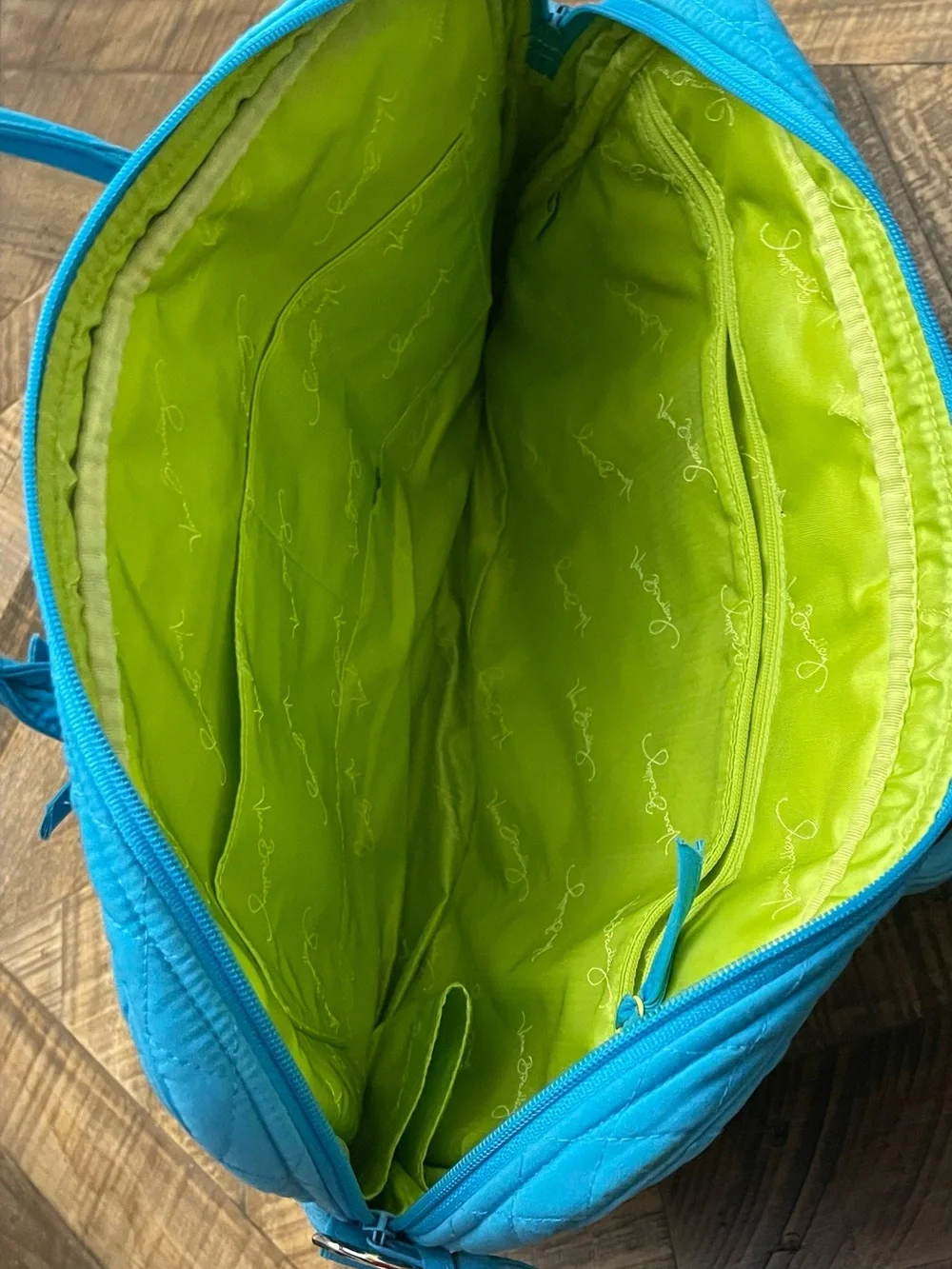 a Vera Bradley Microfiber Turquoise Large Laptop Bag.
